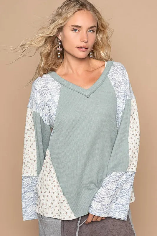 Air force blue POL Lace floral round neck knit top by Trendsi, featuring a delicate lace floral design and comfortable fit.