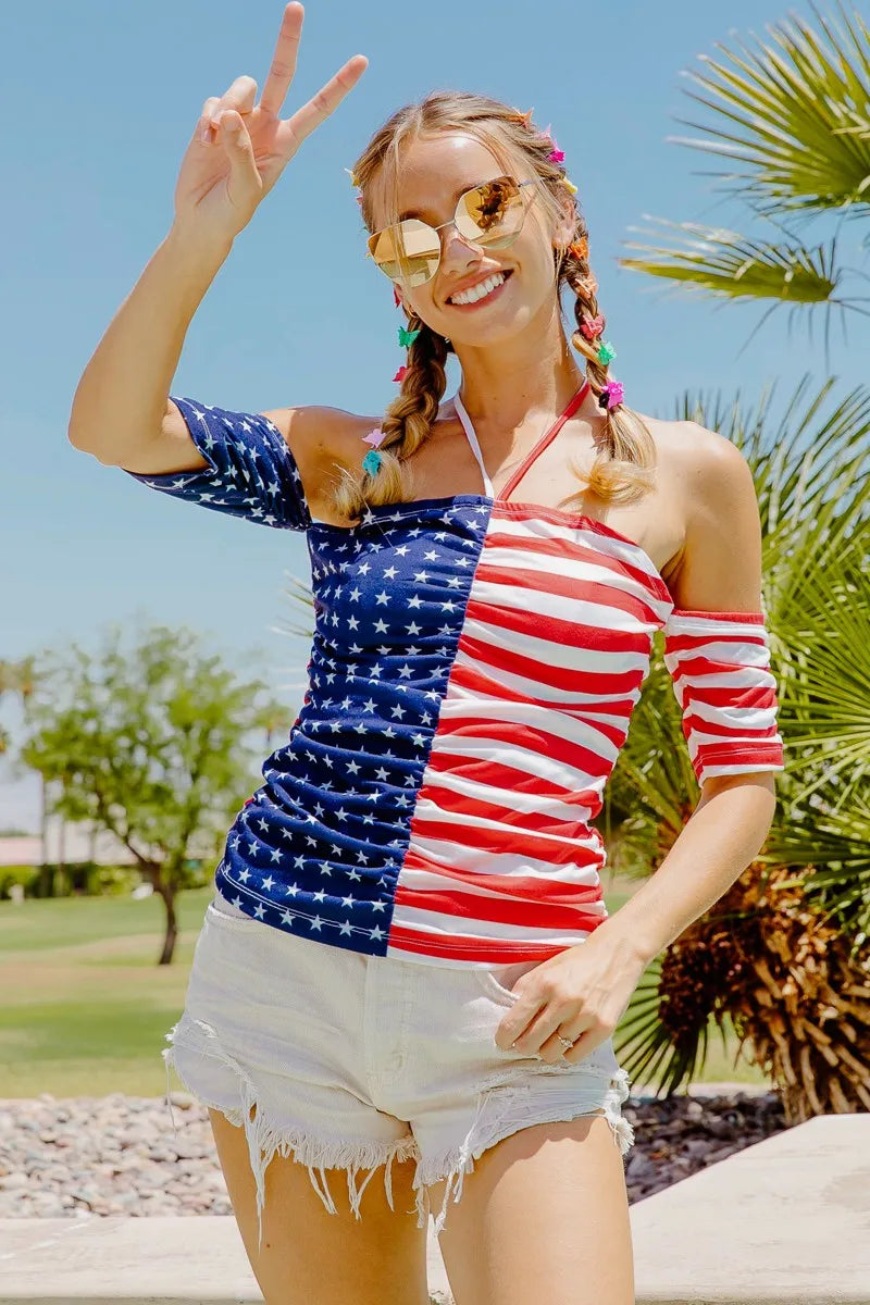 American flag off-shoulder top with front ruched design by Trendsi, featuring a patriotic print and stylish neckline.