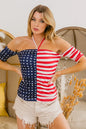 American flag off-shoulder top with front ruching by Trendsi, featuring a stylish patriotic design and casual fit.