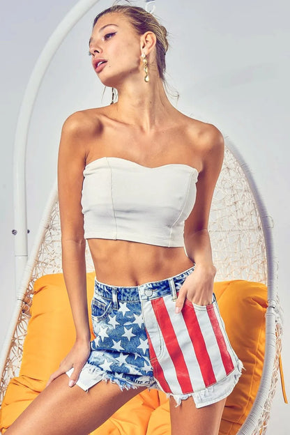 Trendsi BiBi US Flag themed bleached denim shorts featuring American flag design and distressed details.
