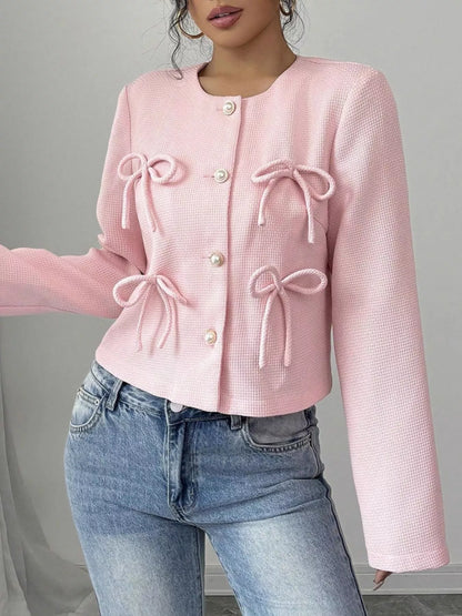 Apricot Bow Detail Cropped Outerwear by Trendsi, featuring a stylish bow accent and cropped fit, perfect for layered outfits.