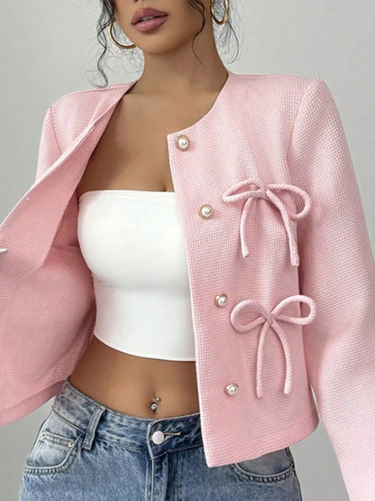 Apricot bow detail cropped outerwear by Trendsi, featuring a stylish front bow and lightweight design for casual wear.