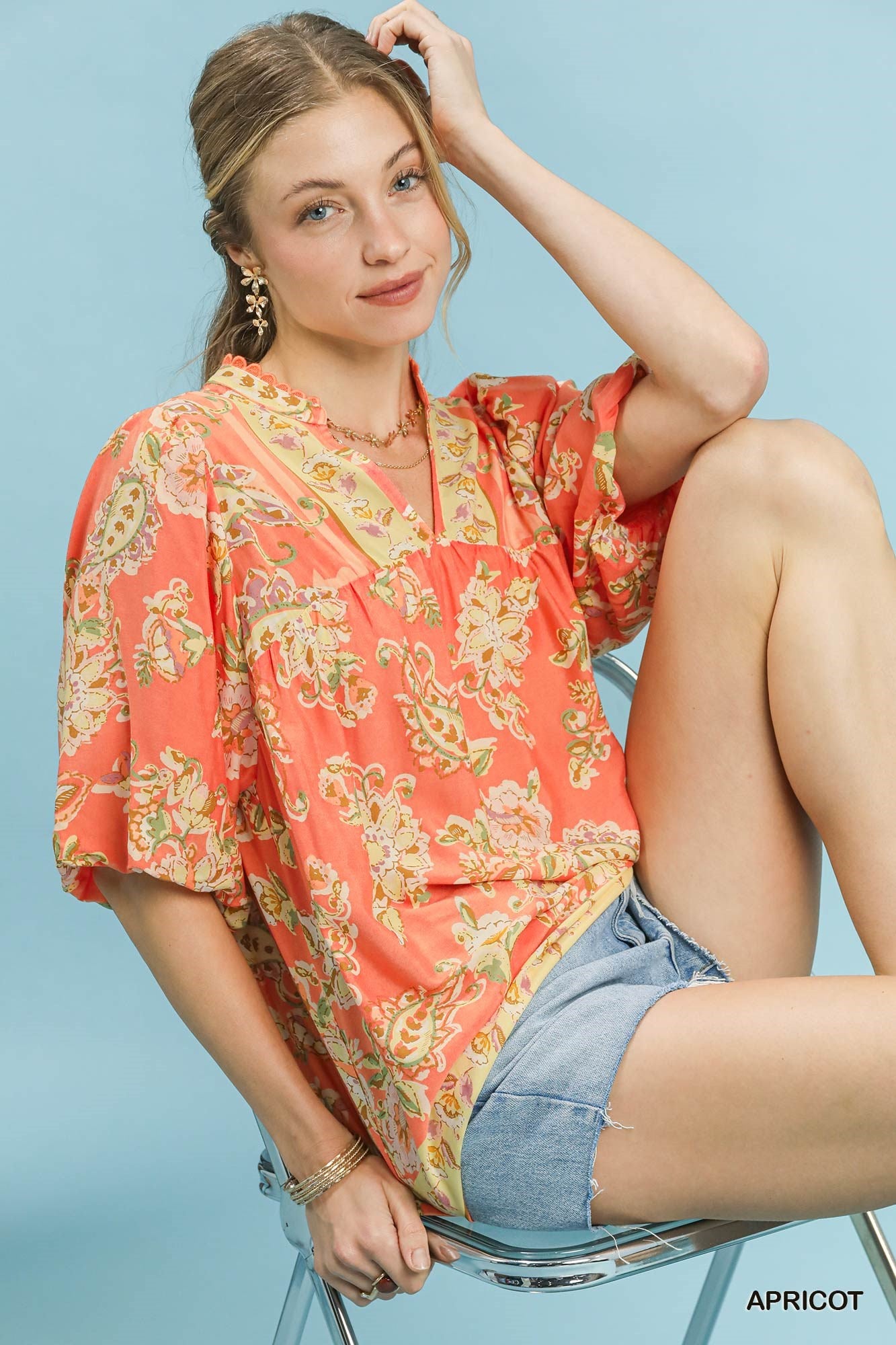 Umgee apricot floral boho blouse with long sleeves and ruffled details, casual and stylish for a relaxed, bohemian look.