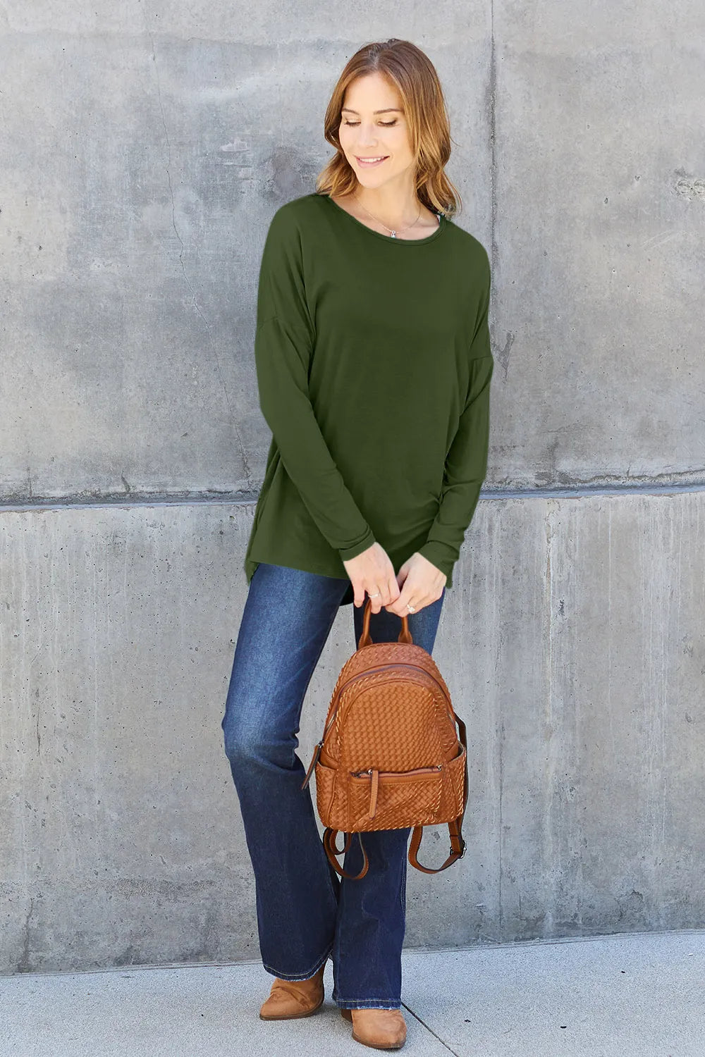 Army green Basic Bae full-size round neck dropped shoulder T-shirt by Trendsi, styled casually on a model.