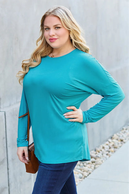 Army green Basic Bae full-size round neck dropped shoulder T-shirt by Trendsi, showing a casual, relaxed fit with long sleeves.