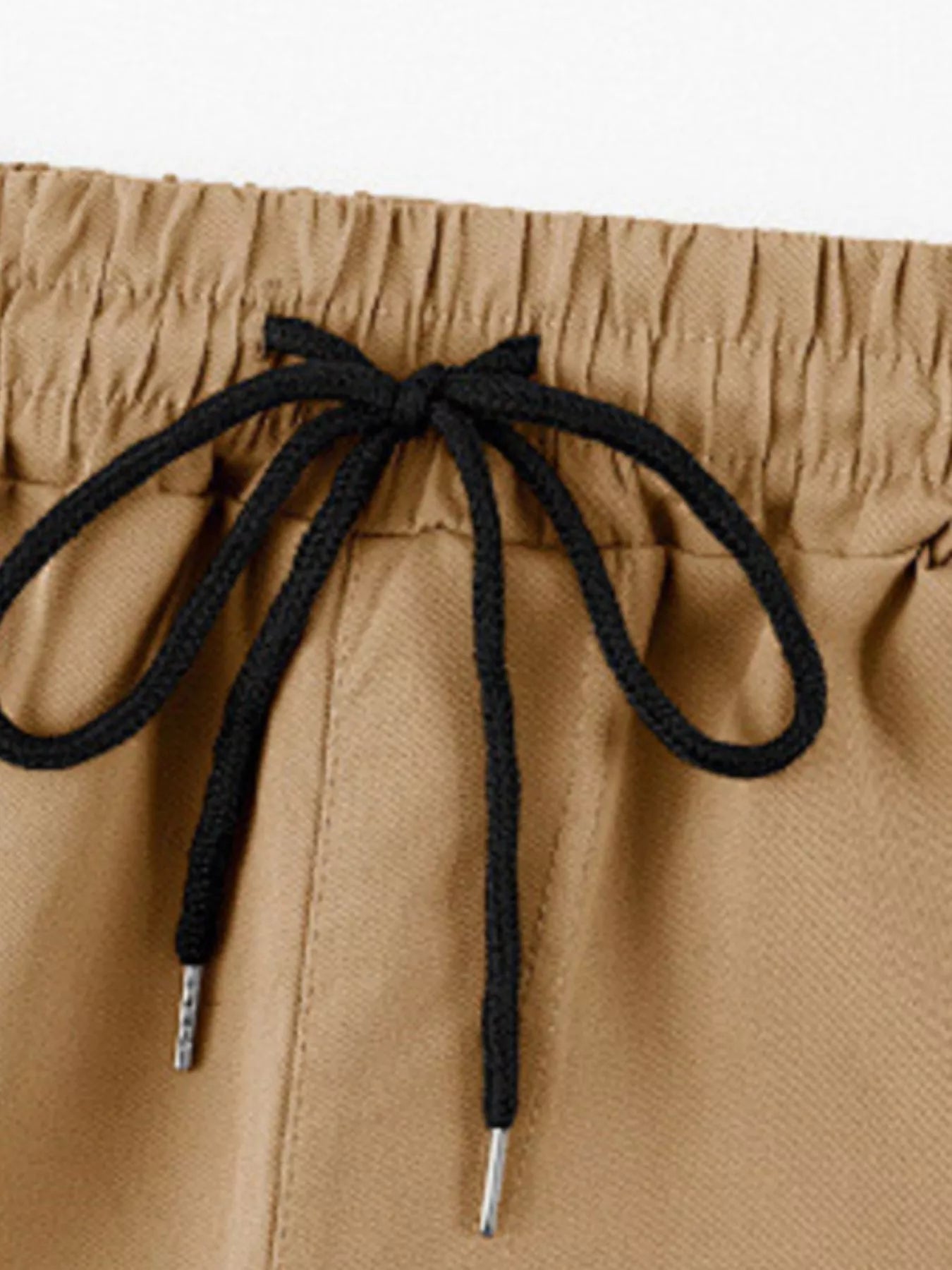 Army green men's full size cargo pants with drawstring waist, plus size, from Trendsi, shown with pockets and relaxed fit.