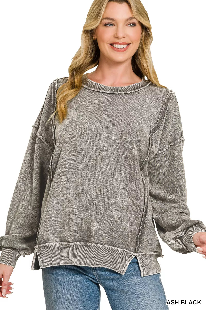 Ash black Zenana snow washed fleece sweatshirt with exposed seams from Trendsi, featuring a cozy, casual fit and soft terry fabric.