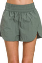 Ash jade Zenana windbreaker running shorts with smocked waistband, designed for comfortable activewear.