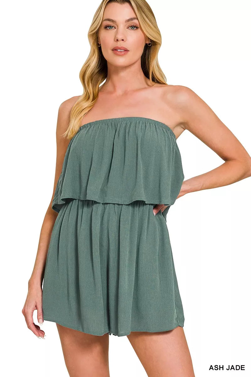Light green Zenana woven crinkle strapless romper with relaxed fit and adjustable straps, ideal for summer casual wear.