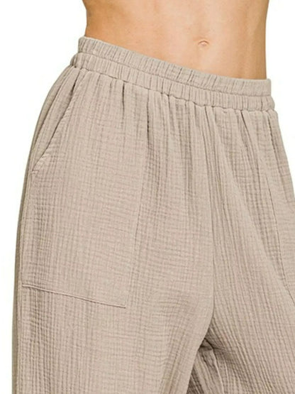 Ash mocha Zenana double gauze elastic band pants with relaxed fit and comfortable waistband, styled for casual wear.
