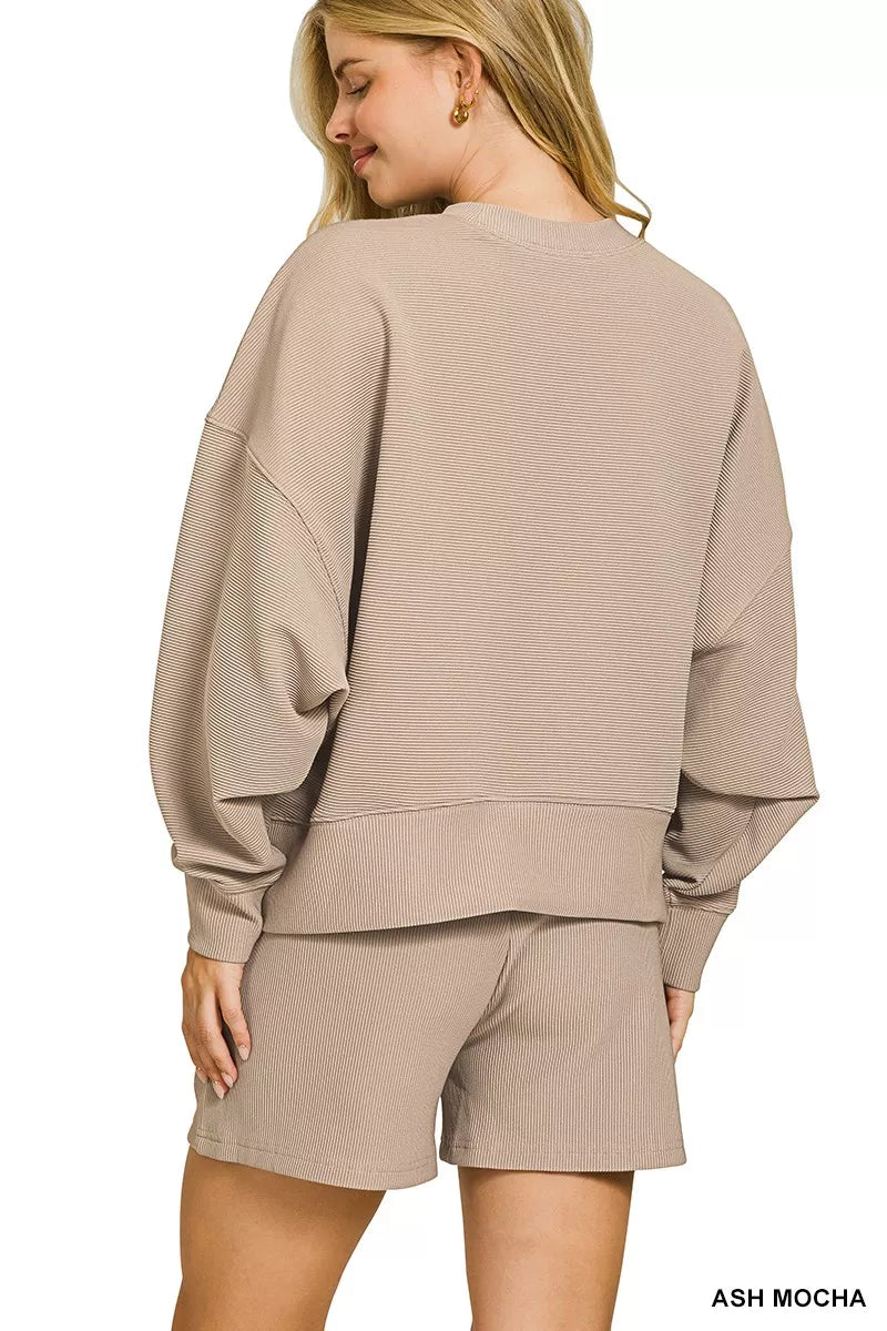 Ash Mocha Zenana ribbed round neck pullover and shorts set by Trendsi, featuring a cozy knit fabric and casual loungewear style.