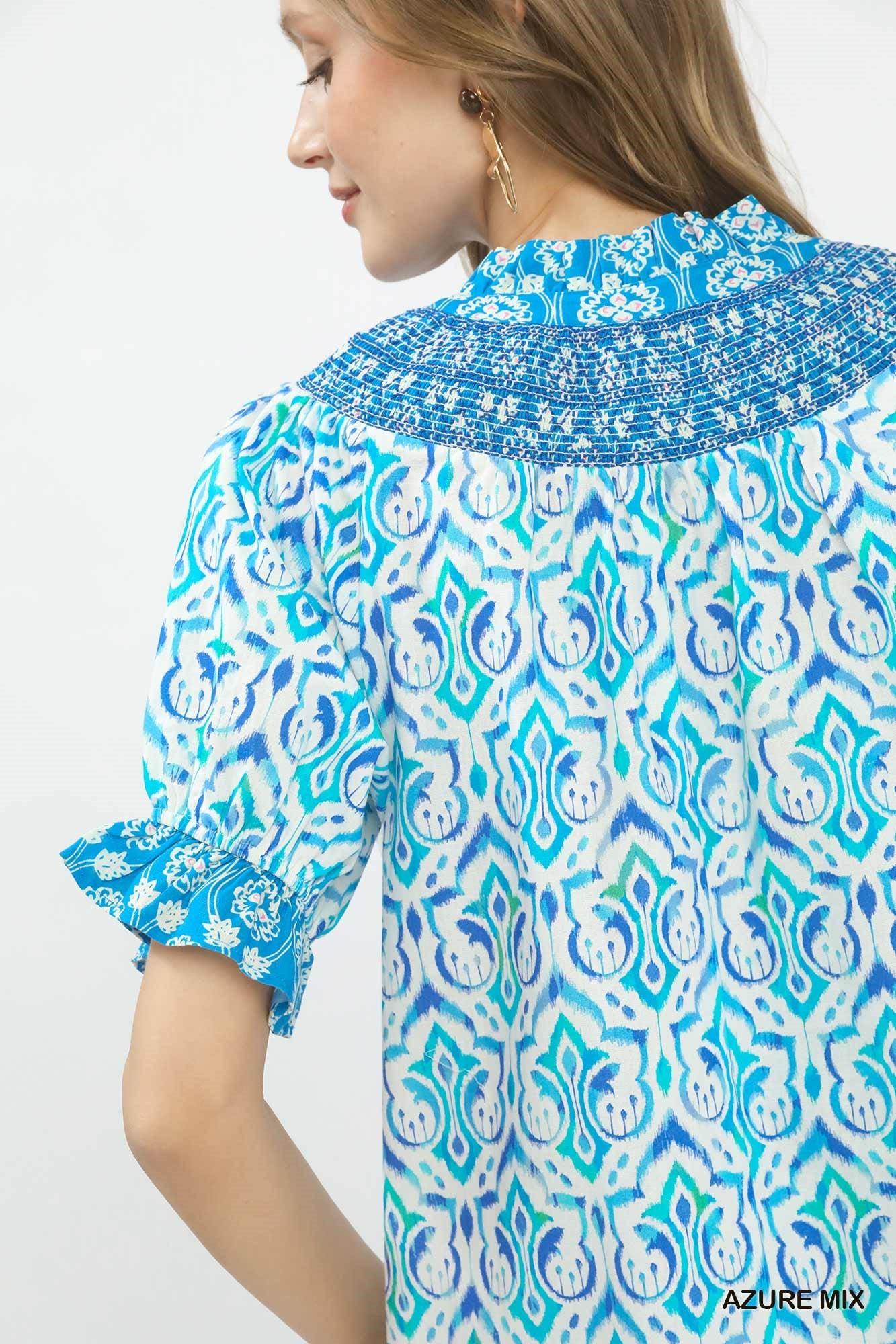 Azure mix boho puff sleeve smocked top by Umgee featuring a relaxed fit and stylish design, perfect for casual and boho fashion.