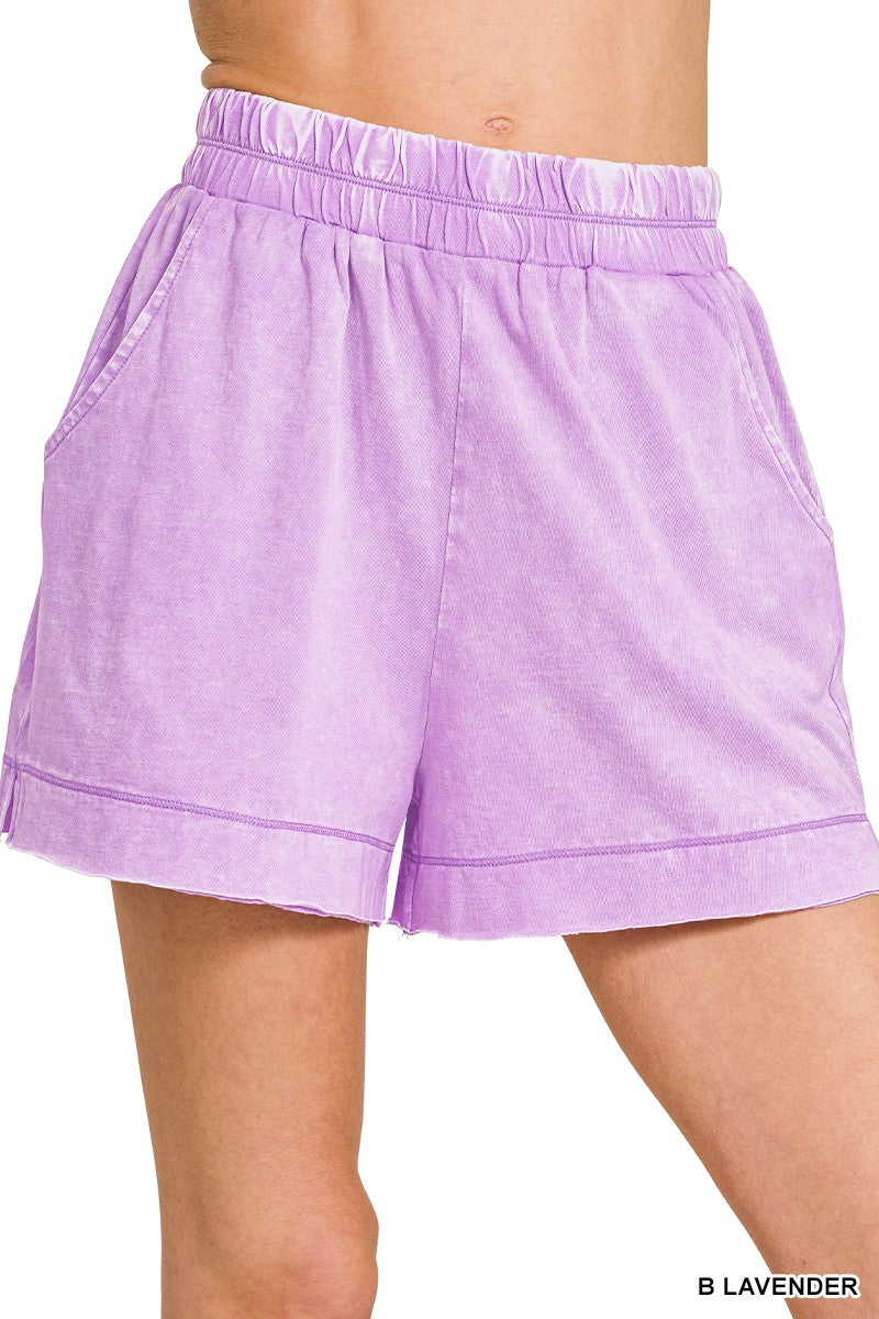Lavender acid-washed oversized top and shorts set by Trendsi, casual loungewear with relaxed fit and stylish wash.