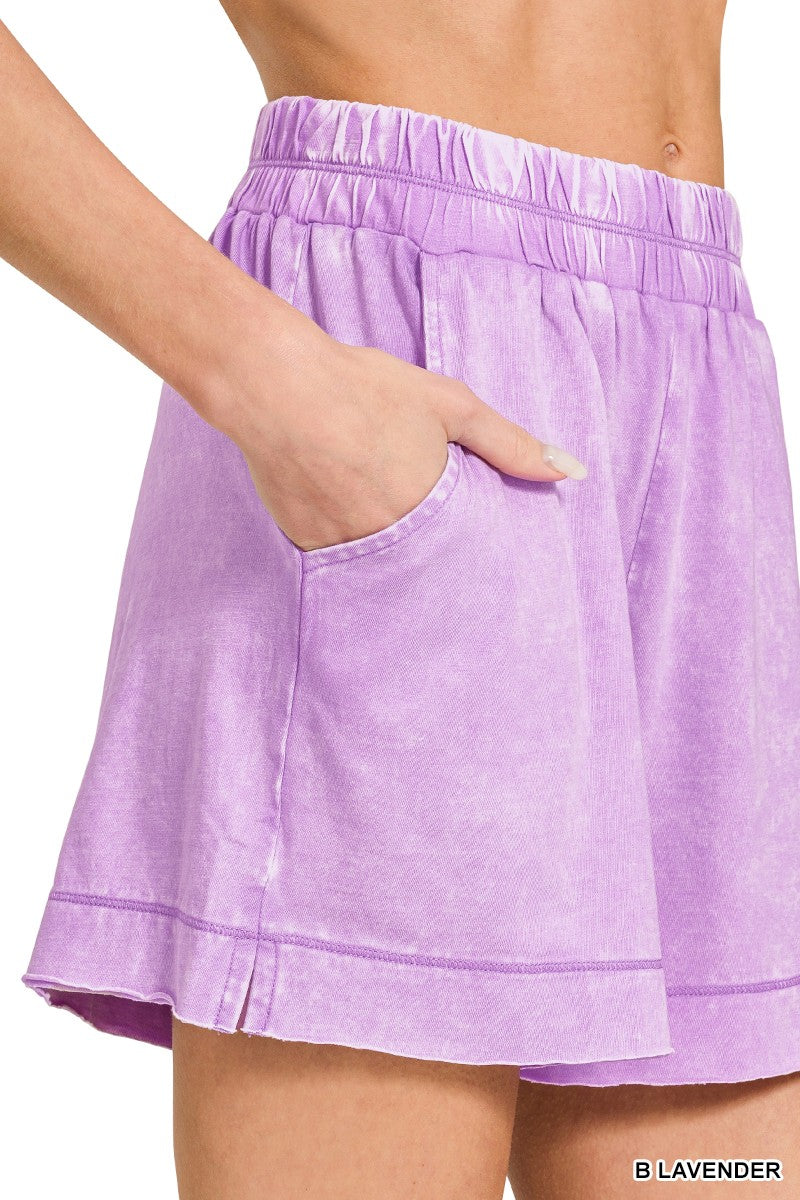 Lavender acid-washed oversized top and shorts set by Trendsi, casual loungewear with relaxed fit and soft fabric.