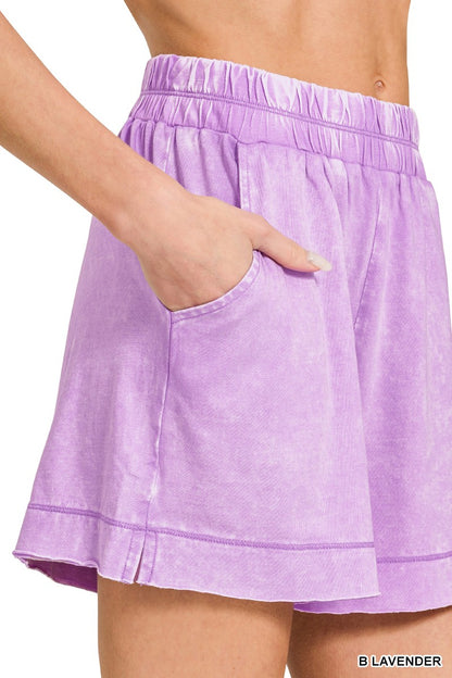 Lavender acid-washed oversized top and shorts set by Trendsi, casual loungewear with relaxed fit and soft fabric.