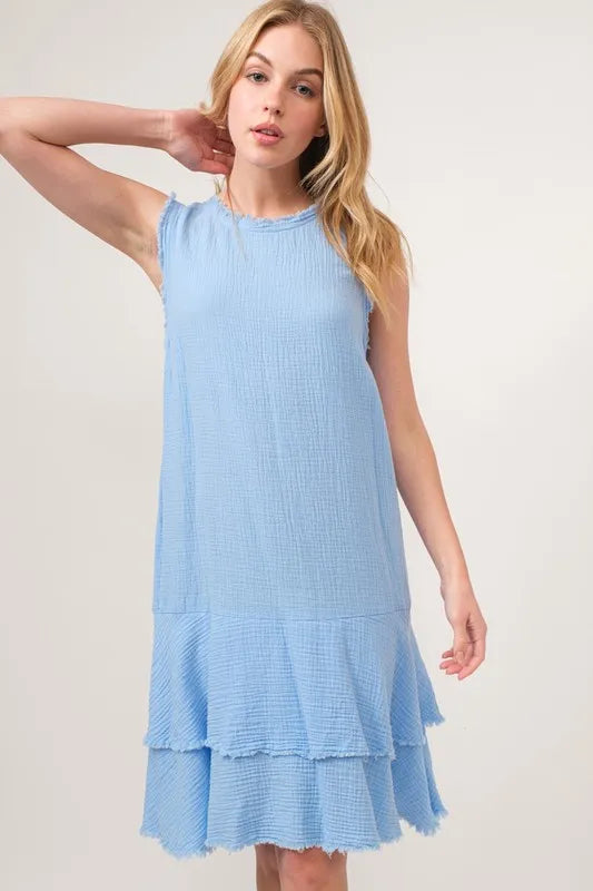 Baby blue tiered dress with washed fringe detail from And The Why by Trendsi, featuring a flowing, layered design.