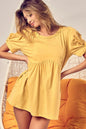 Trendsi BiBi cotton span knit baby doll top with puff sleeves, featuring a stylish and comfortable fit.