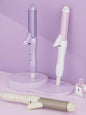 Beige 2-in-1 rotating hair curling iron by Trendsi with European plug, showcasing its sleek design and rotating barrel.