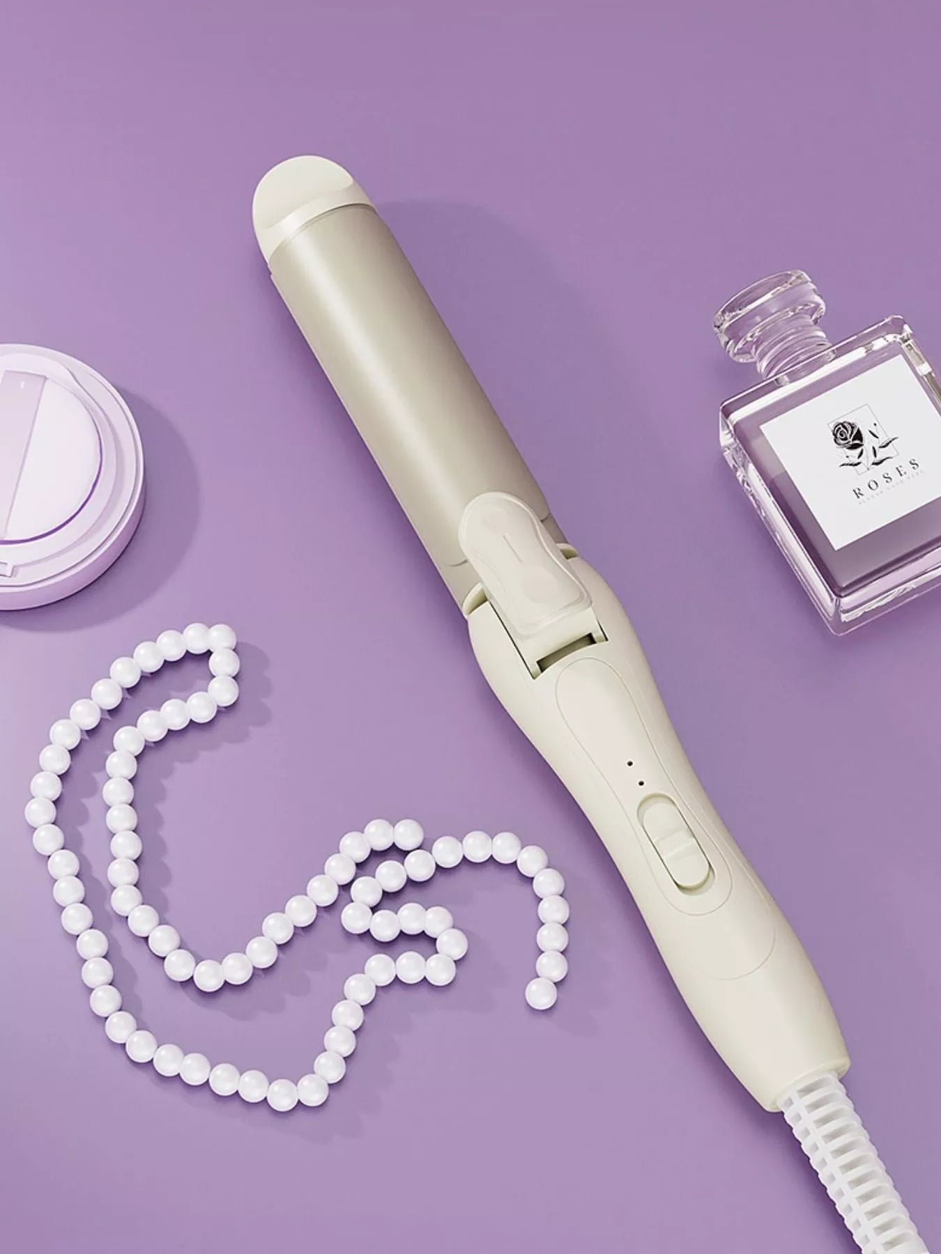 Beige 2-in-1 rotating hair curling iron by Trendsi with European plug, designed for versatile, effortless curling.