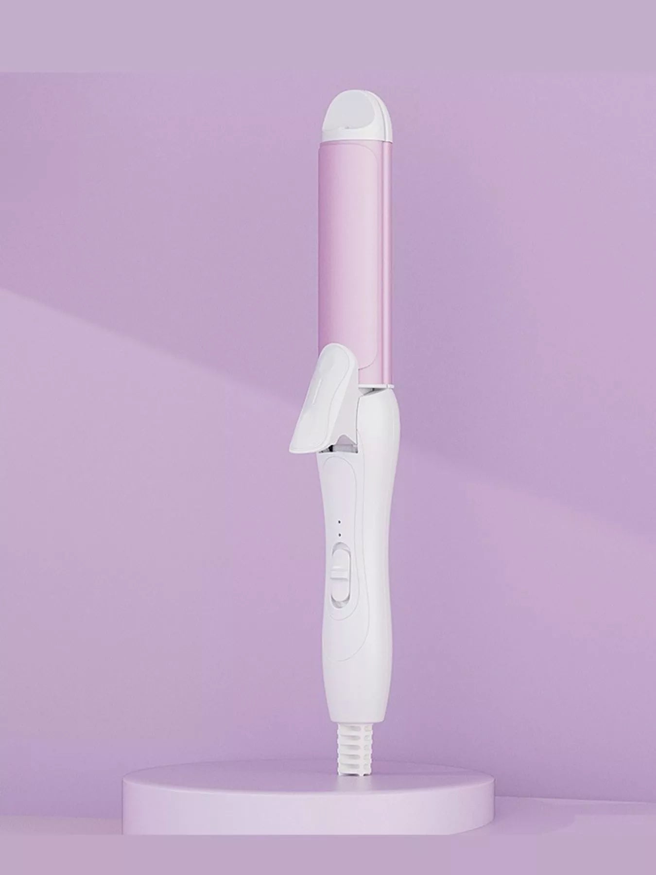 Beige 2-in-1 rotating hair curling iron with European plug by Trendsi, showing the curling barrel and ergonomic handle.