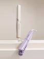 Beige adjustable temperature curling iron by Trendsi with European plug, showcasing its sleek design and ergonomic handle.