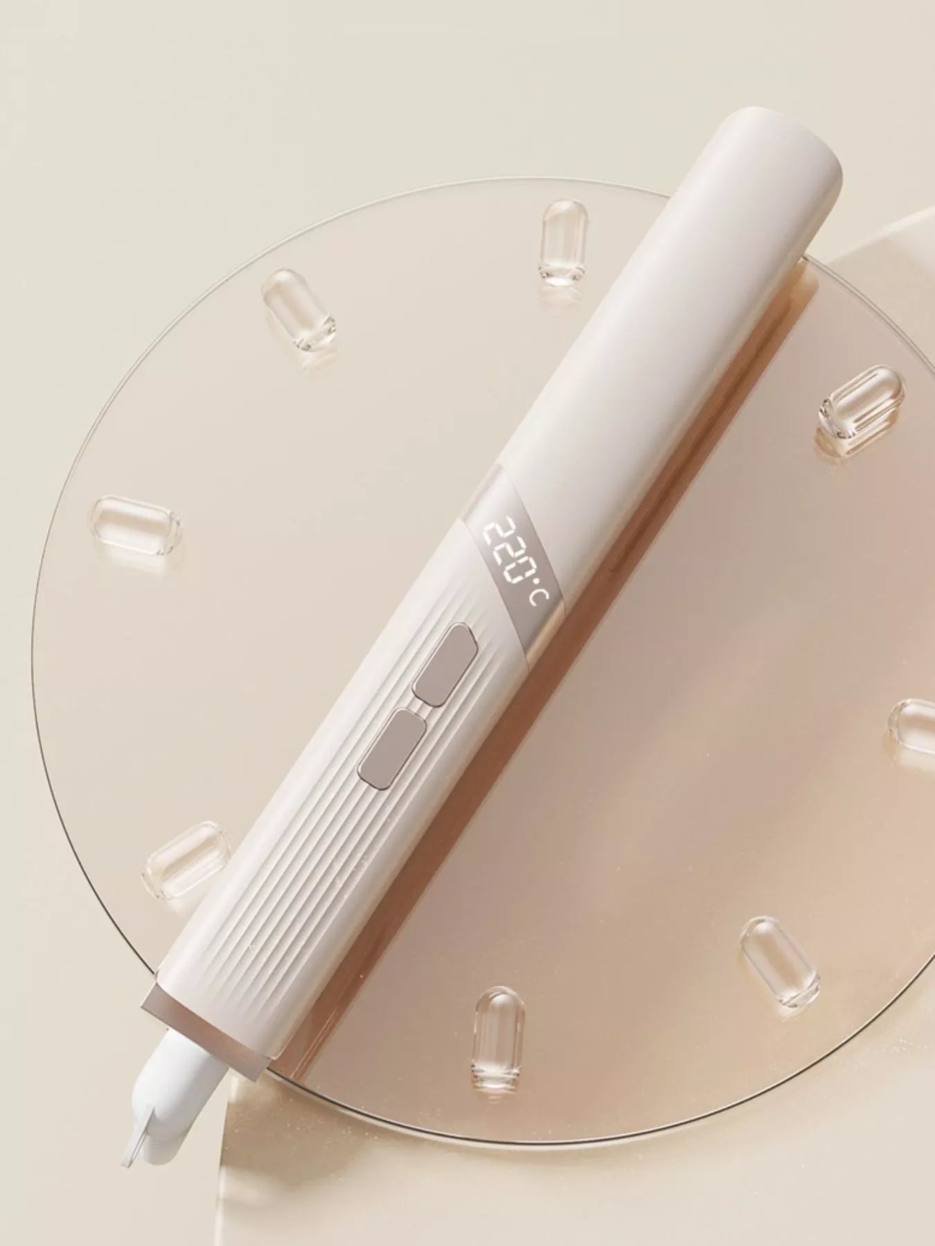Beige adjustable temperature curling iron with European plug from Trendsi, showing the curling barrel and control dial
