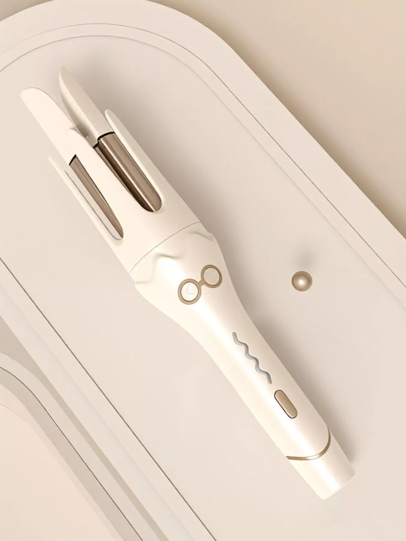 Beige automatic rotating ceramic hair curling iron by Trendsi with European plug and ergonomic handle.