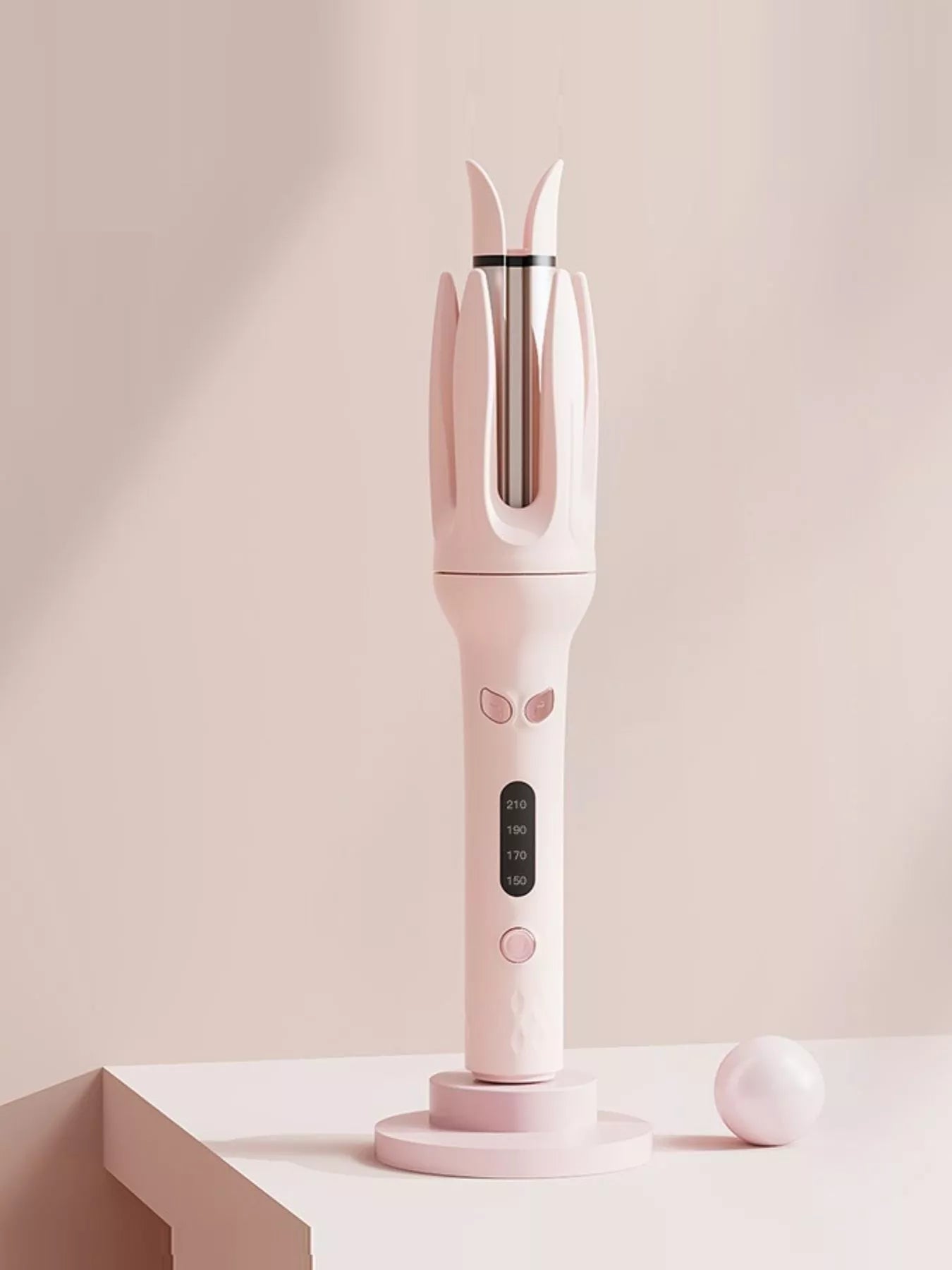Beige automatic rotating hair curling iron by Trendsi with European plug, showcasing its sleek design and rotating barrel.