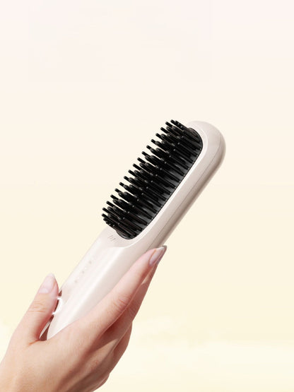 Beige portable heated straightening comb from Trendsi with sleek design for easy hair styling.