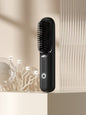 Beige portable heated straightening comb by Trendsi, with wide teeth for easy hair styling and straightening.