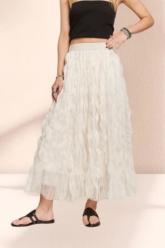 Beige ADORA elastic waist cloud fluffy maxi skirt by Trendsi, featuring a soft, voluminous fabric and comfortable fit.