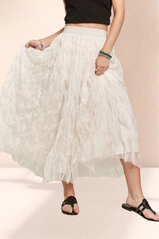 Beige ADORA elastic waist cloud fluffy maxi skirt by Trendsi, featuring a soft, flowing fabric and comfortable fit.