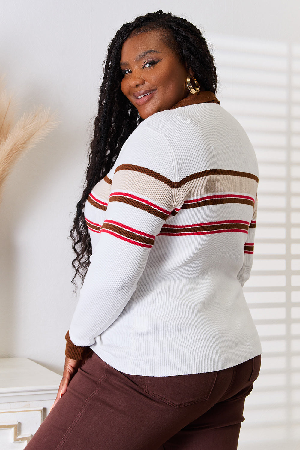 Beige striped rib-knit top with collared neck from Trendsi's Basic Bae collection, featuring a fitted design and long sleeves.