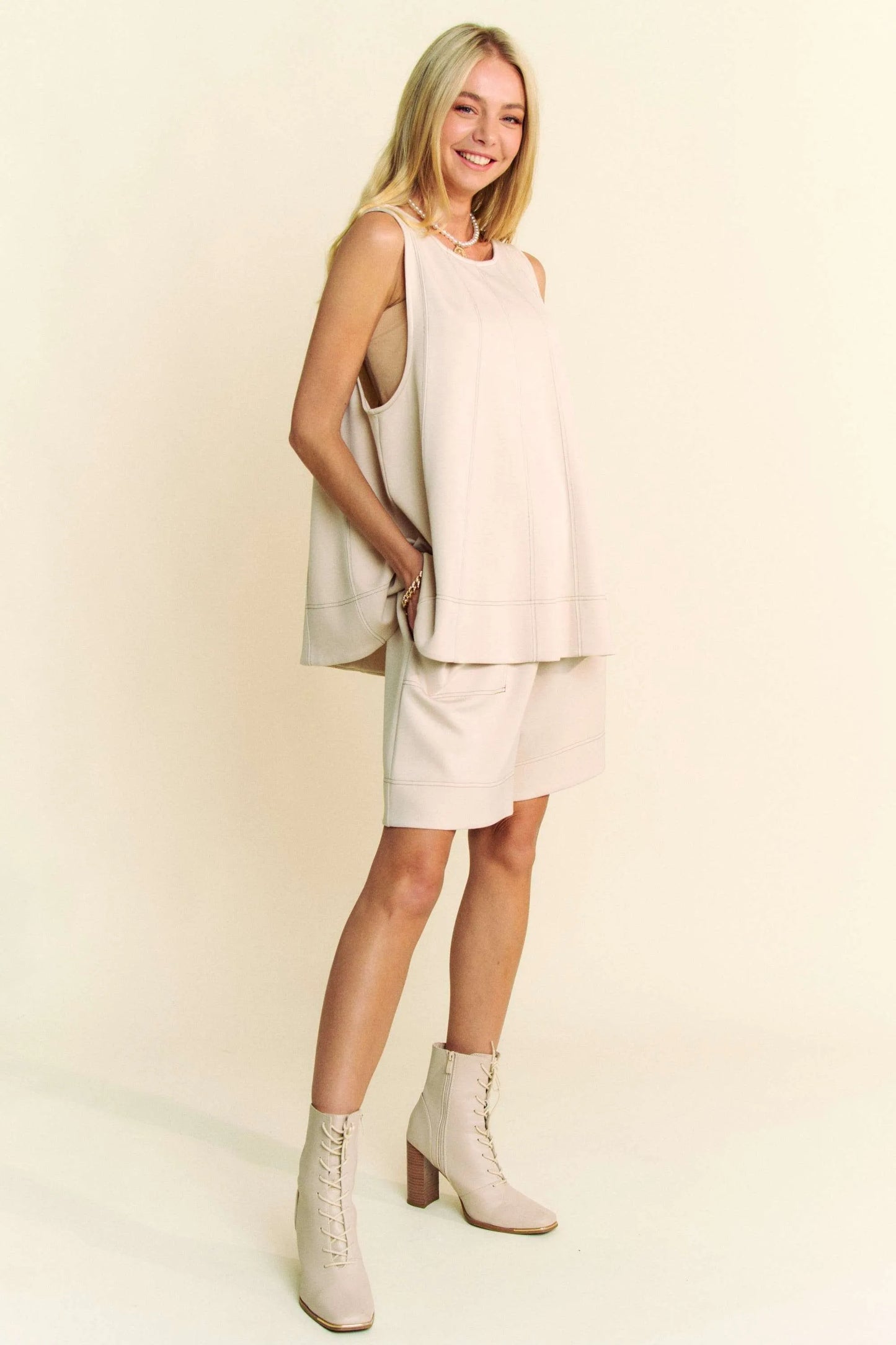 Beige Davi & Dani contrast seam top and short set by Trendsi, featuring stylish detailing and casual fit.