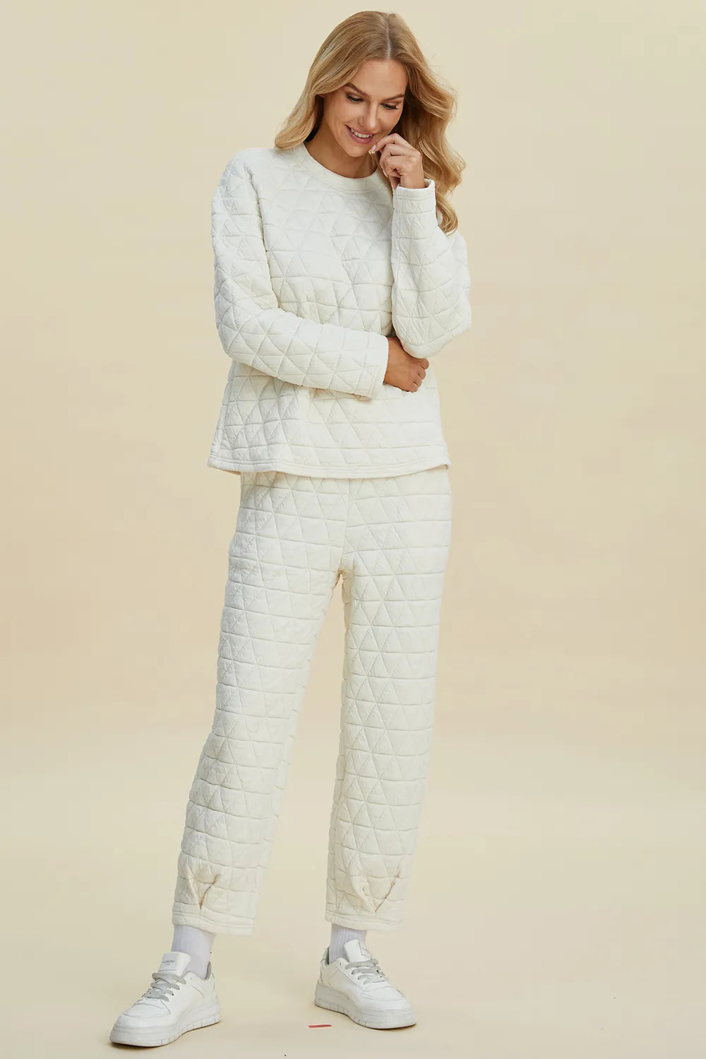 Beige Trendsi Double Take full-size textured round neck long sleeve top and matching pants set, casual loungewear ensemble.