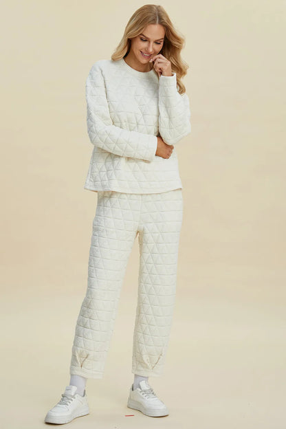 Beige Trendsi Double Take full-size textured round neck long sleeve top and matching pants set, casual loungewear ensemble.