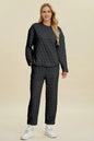 Beige Trendsi double take full-size texture round neck long sleeve top and pants set, casual and comfortable for everyday wear.