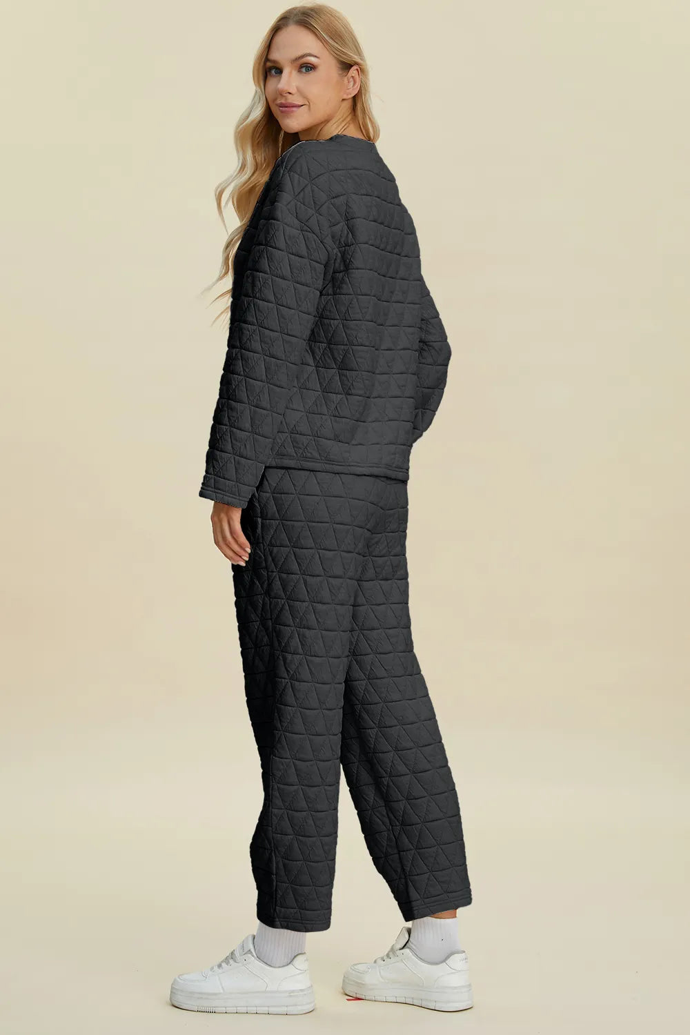 Beige Trendsi Double Take full-size textured round neck long sleeve top and matching pants set on a model.