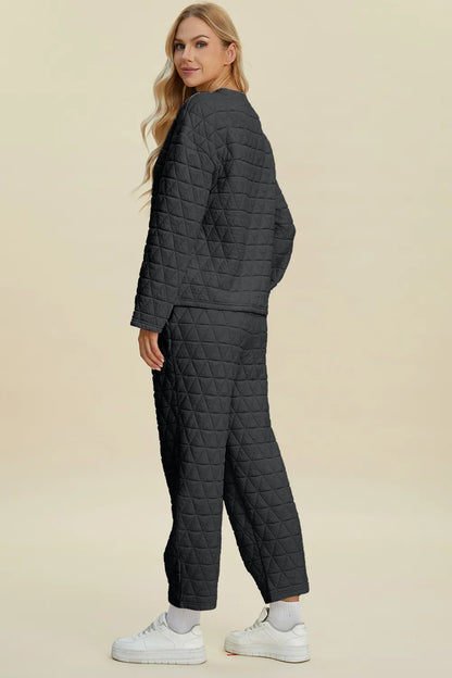 Beige Trendsi Double Take full-size textured round neck long sleeve top and matching pants set on a model.