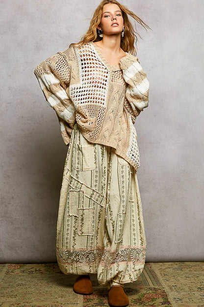 Beige POL color-blocked stripe pattern knit top with twisted weave from Trendsi, featuring bold, modern design and textured fabric.