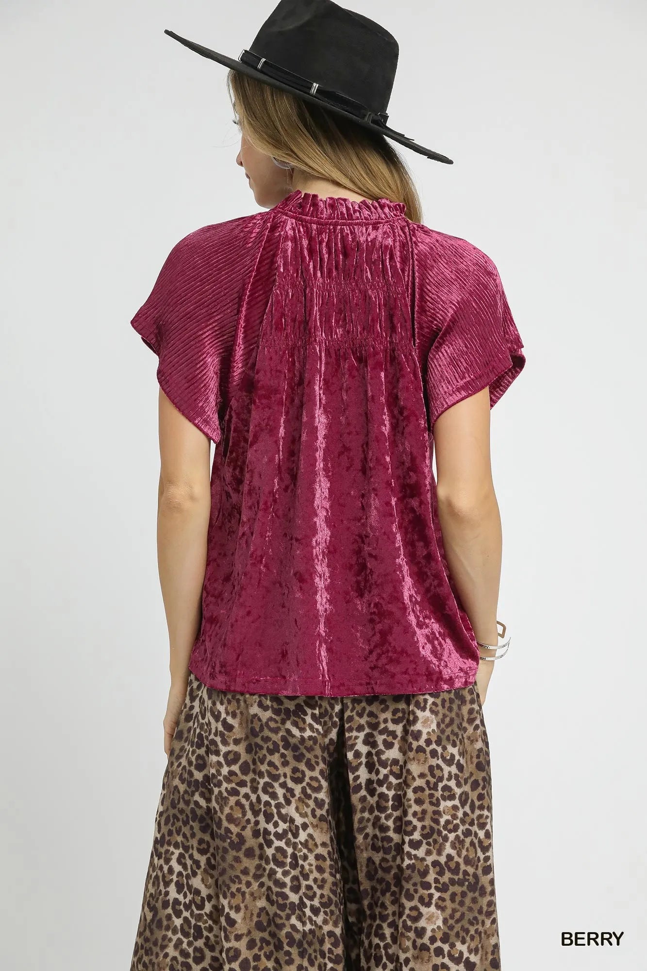 Umgee crushed velvet pleated blouse in berry color, featuring a stylish, textured design and elegant pleats.