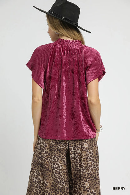 Umgee crushed velvet pleated blouse in berry color, featuring a stylish, textured design and elegant pleats.