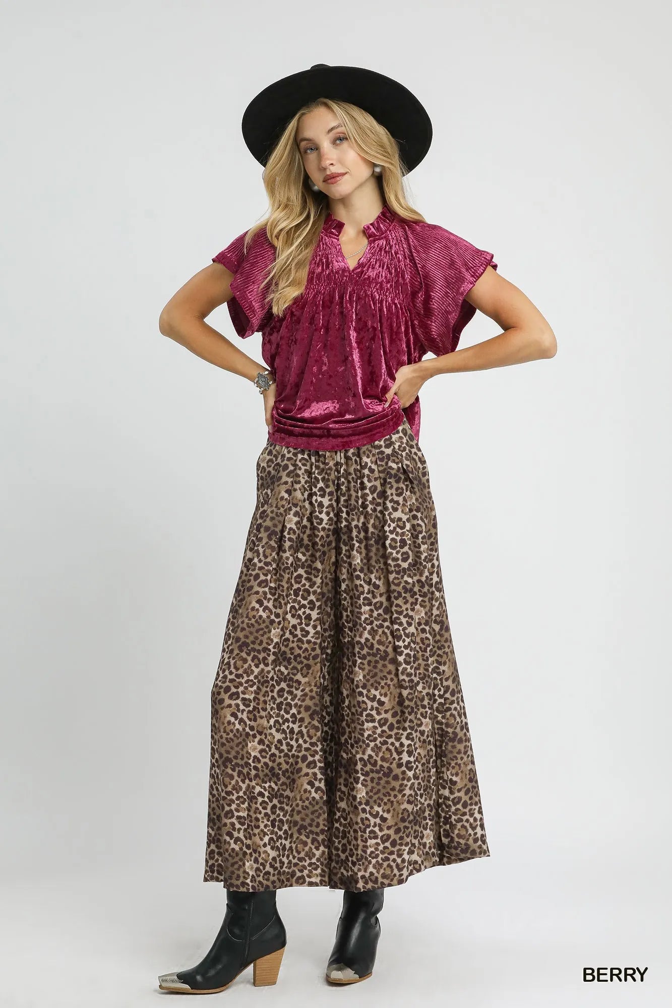 Crushed velvet pleated blouse by Umgee featuring soft fabric and stylish design, shown in a rich berry color.