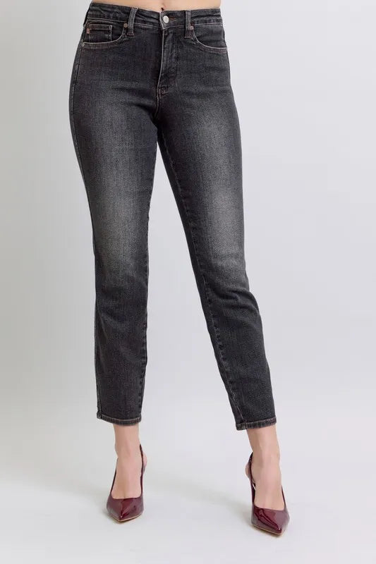 Full view of Judy Blue plus size mid-rise tummy control slim jeans, showcasing classic denim fit and stylish design.