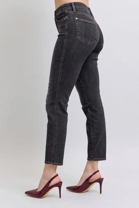 Full view of Judy Blue plus size mid-rise tummy control slim jeans, showing classic denim style and fit.