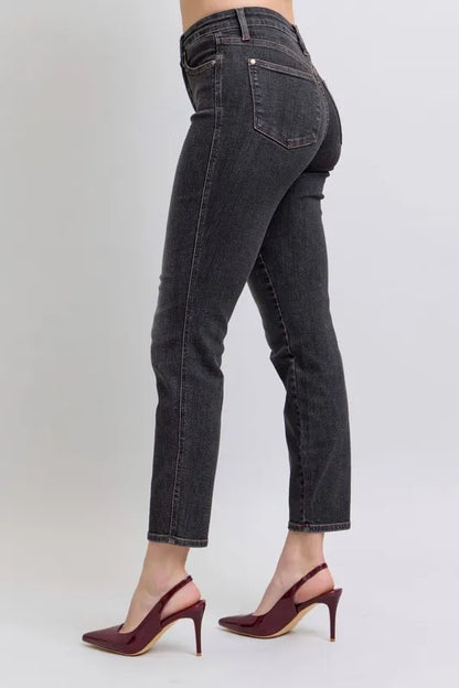 Full view of Judy Blue plus size mid-rise tummy control slim jeans, showing classic denim style and fit.
