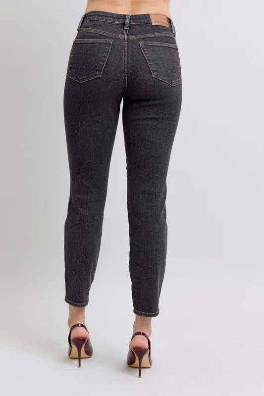 Full view of Judy Blue plus size mid-rise tummy control slim jeans, showing the dark wash, fitted style, and classic jean details.