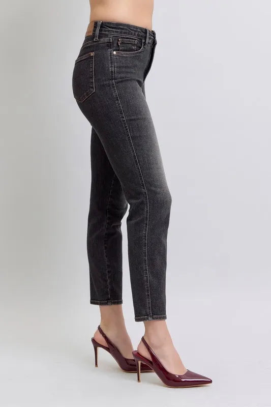 Plus size Judy Blue mid-rise tummy control slim jeans with full coverage and classic denim look, designed for a comfortable fit.