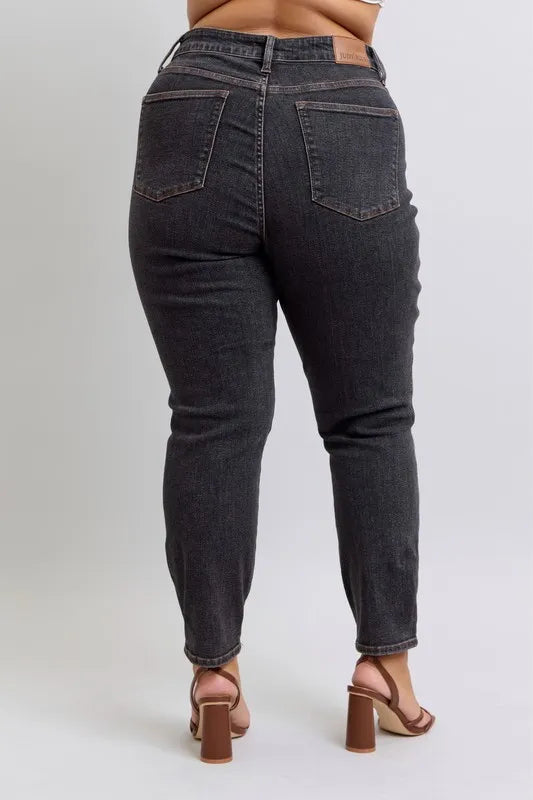 Full view of Judy Blue plus size mid-rise slim jeans with tummy control, showcasing the dark wash and classic jean style.