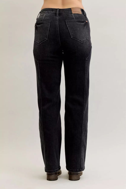 Light blue Judy Blue mid-rise straight jeans with western seam details, denim fabric, and classic five-pocket design.